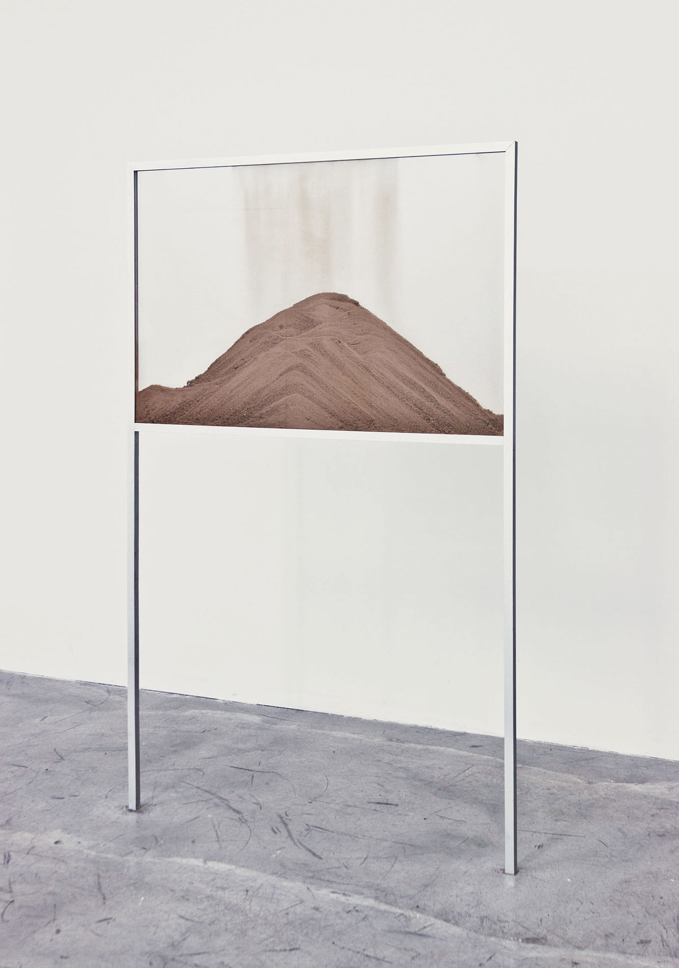 Nicholas Mangan, *A World Undone (Protolith)*, 2012, aluminium, glass, crushed zircon rock, 150 × 90 × 3 cm. Installation view, LABOR, Mexico, DF. Photographer: Isaac Contreras.